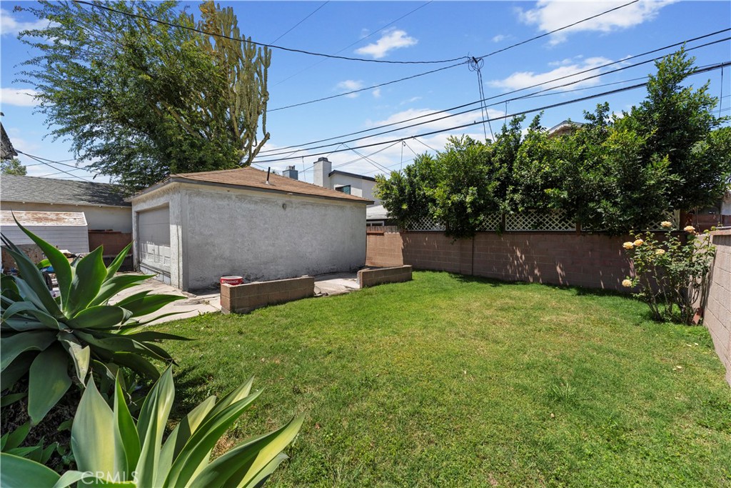 2725 East Tyler Street Carson, CA 90810 - Photo 19 of 30 a view of a backyard with plants