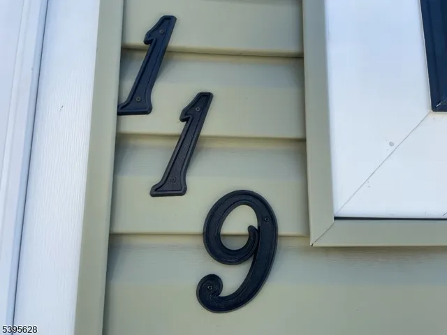 a close view of faucet a washer and dryer