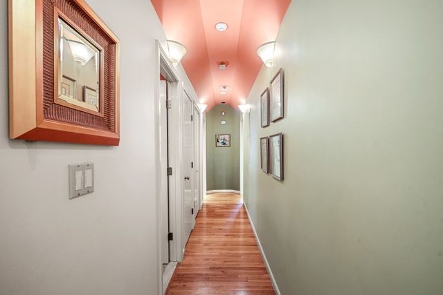 a view of a hallway with front door