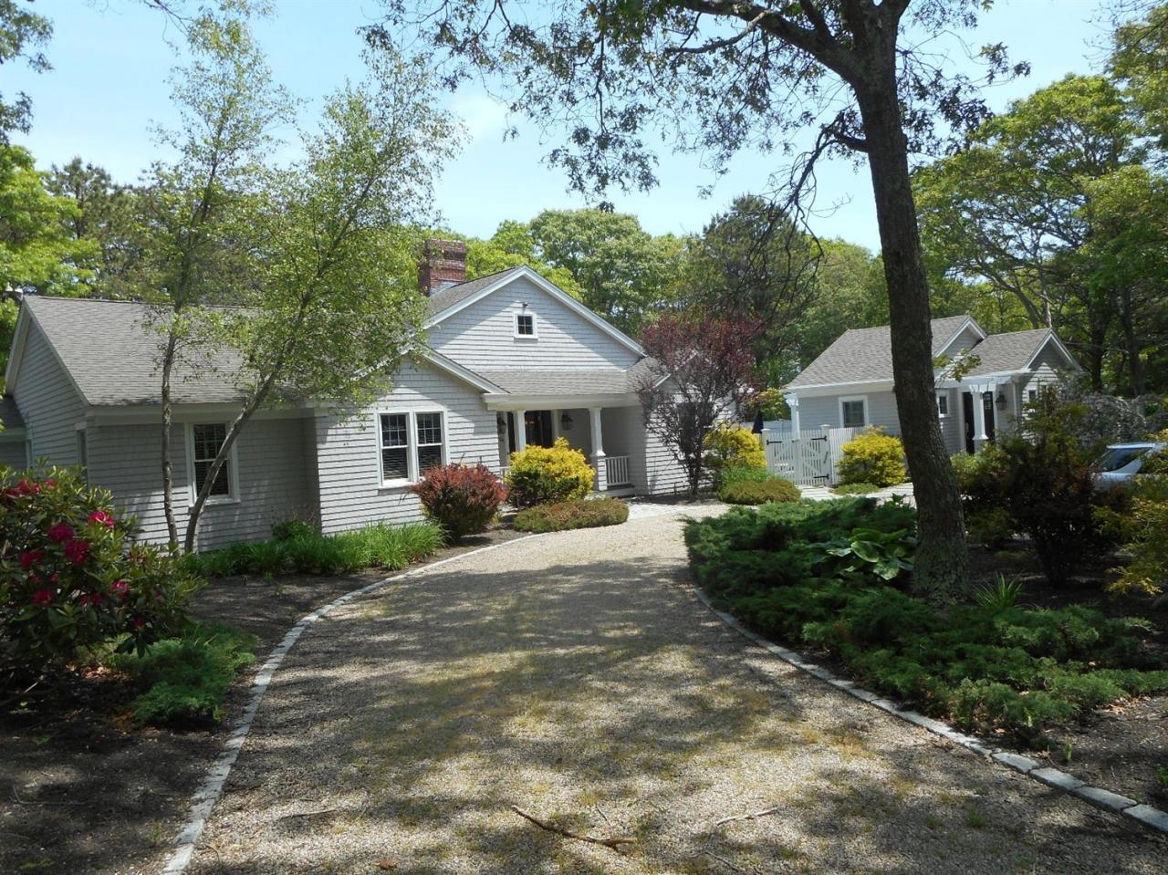 84 Troon Way Mashpee, MA 02649 - Photo 30 of 31 a front view of a house with garden