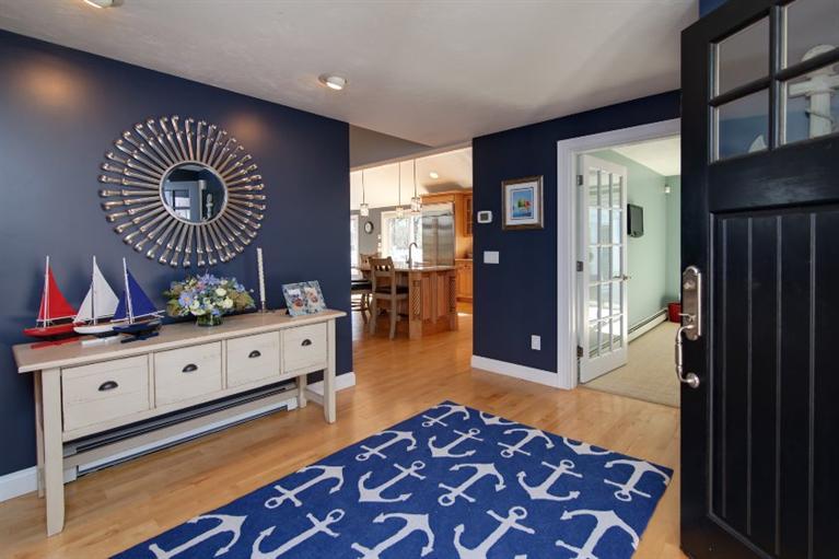 84 Troon Way Mashpee, MA 02649 - Photo 6 of 31 a room with lots of wooden furniture and a rug