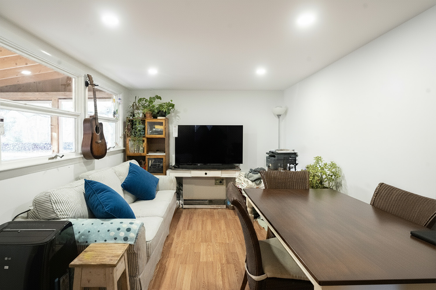 45 Quenames Road Chilmark, MA 02535 - Photo 3 of 13 a living room with furniture and a flat screen tv