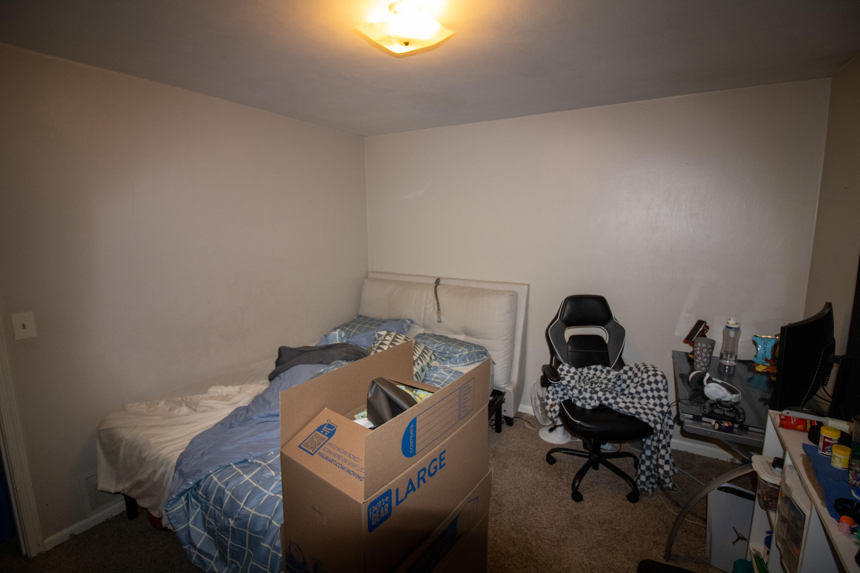 1748 Elbert Drive Roanoke, VA 24018 - Photo 17 of 18 a bedroom with bed and a bookshelf