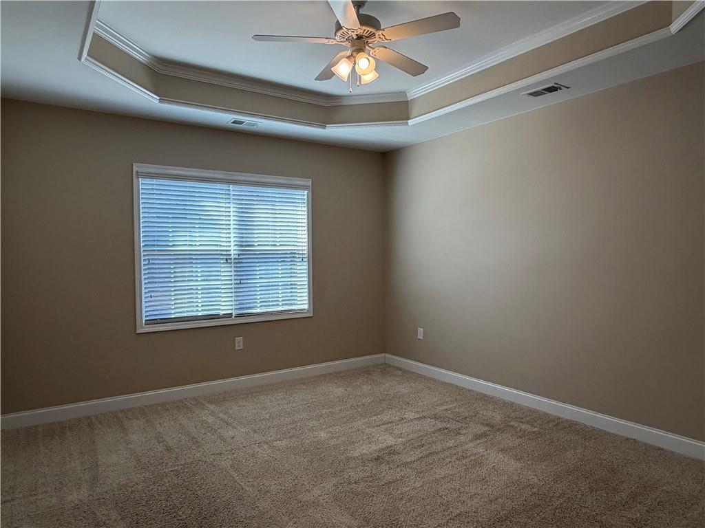 3329 Ivy Ridge Court, Unit 791 Buford, GA 30519 - Photo 16 of 36 a view of an empty room with a window