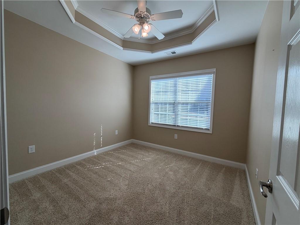 3329 Ivy Ridge Court, Unit 791 Buford, GA 30519 - Photo 22 of 36 a view of an empty room with a window