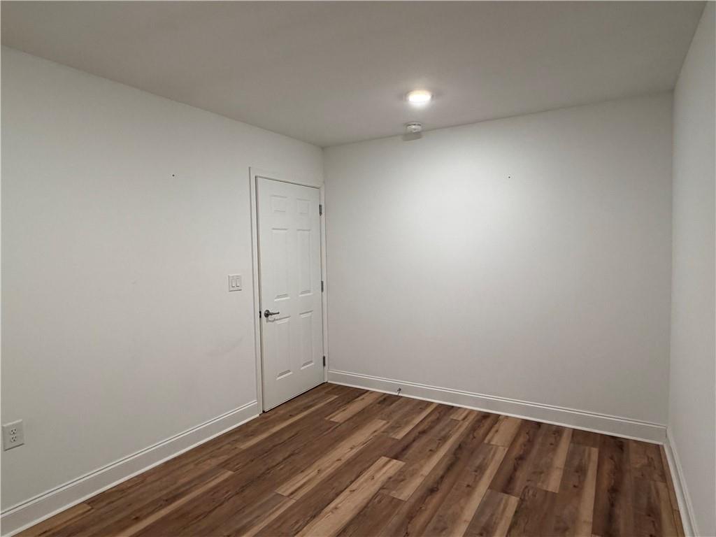 3329 Ivy Ridge Court, Unit 791 Buford, GA 30519 - Photo 28 of 36 a view of room with wooden floor