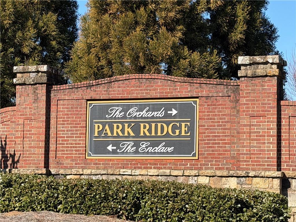 3329 Ivy Ridge Court, Unit 791 Buford, GA 30519 - Photo 30 of 36 a sign on the side of a building