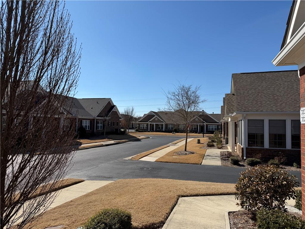 3329 Ivy Ridge Court, Unit 791 Buford, GA 30519 - Photo 33 of 36 a view of a house with a yard