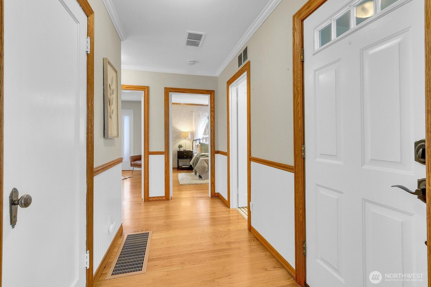 417 Ave F, Unit C Snohomish, WA 98290 - Photo 22 of 33 a view of a hallway with wooden floor and staircase