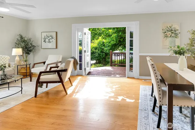 a view of a dining room with furniture window and outside view