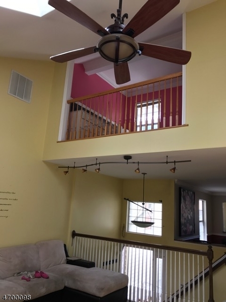 41 Rhea Run Newton, NJ 07860 - Photo 10 of 17 a view of a hallway with a chandelier