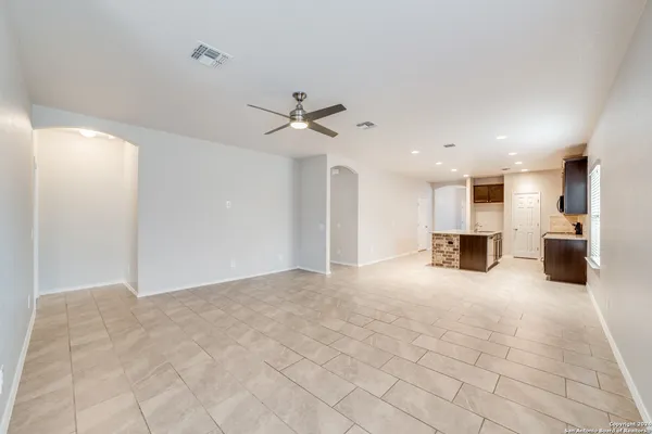 a view of a livingroom with a kitchen