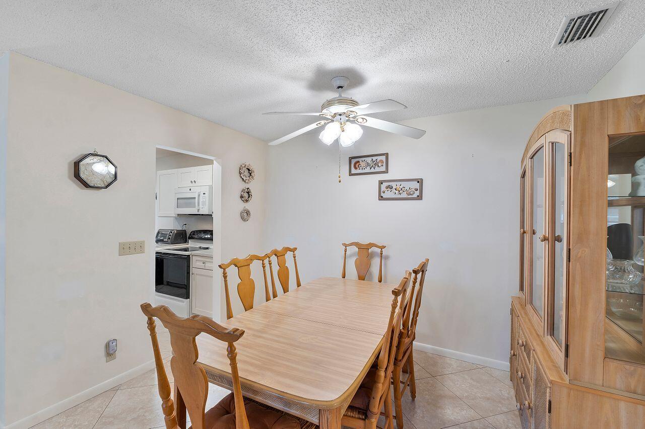 5130 Nesting Way, Unit D Delray Beach, FL 33484 - Photo 10 of 41 Dining Area