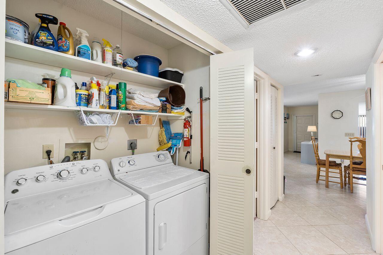 5130 Nesting Way, Unit D Delray Beach, FL 33484 - Photo 21 of 41 a view of utility room and children play room