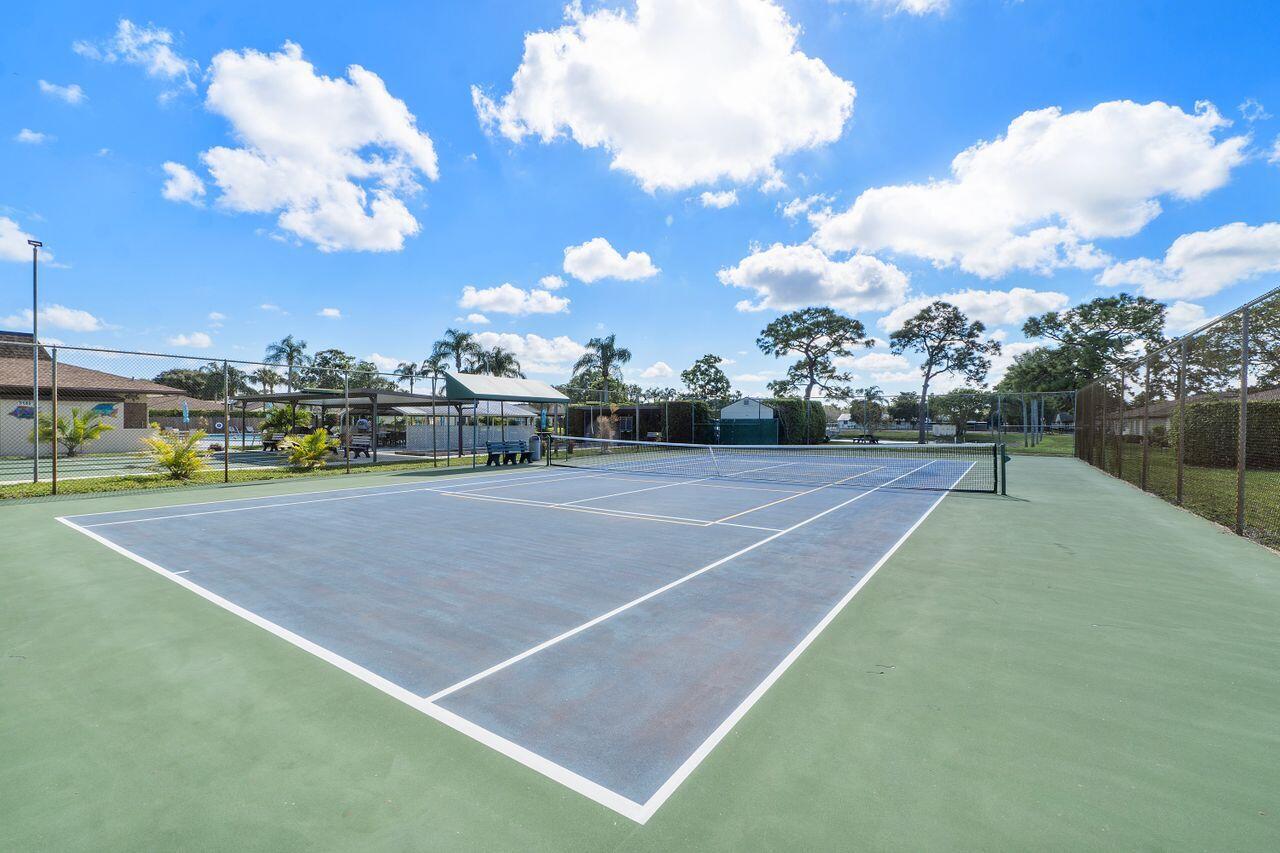 5130 Nesting Way, Unit D Delray Beach, FL 33484 - Photo 36 of 41 a view of a basket ball ground