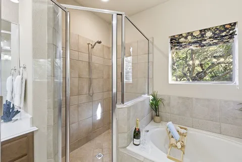 a bathroom with a sink a toilet and vanity