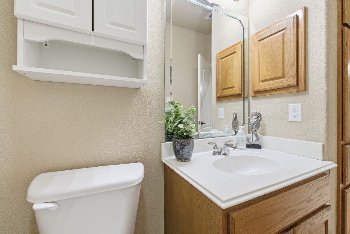 2291 Frontier Spring Branch, TX 78070 - Photo 25 of 39 a bathroom with a sink a toilet and vanity