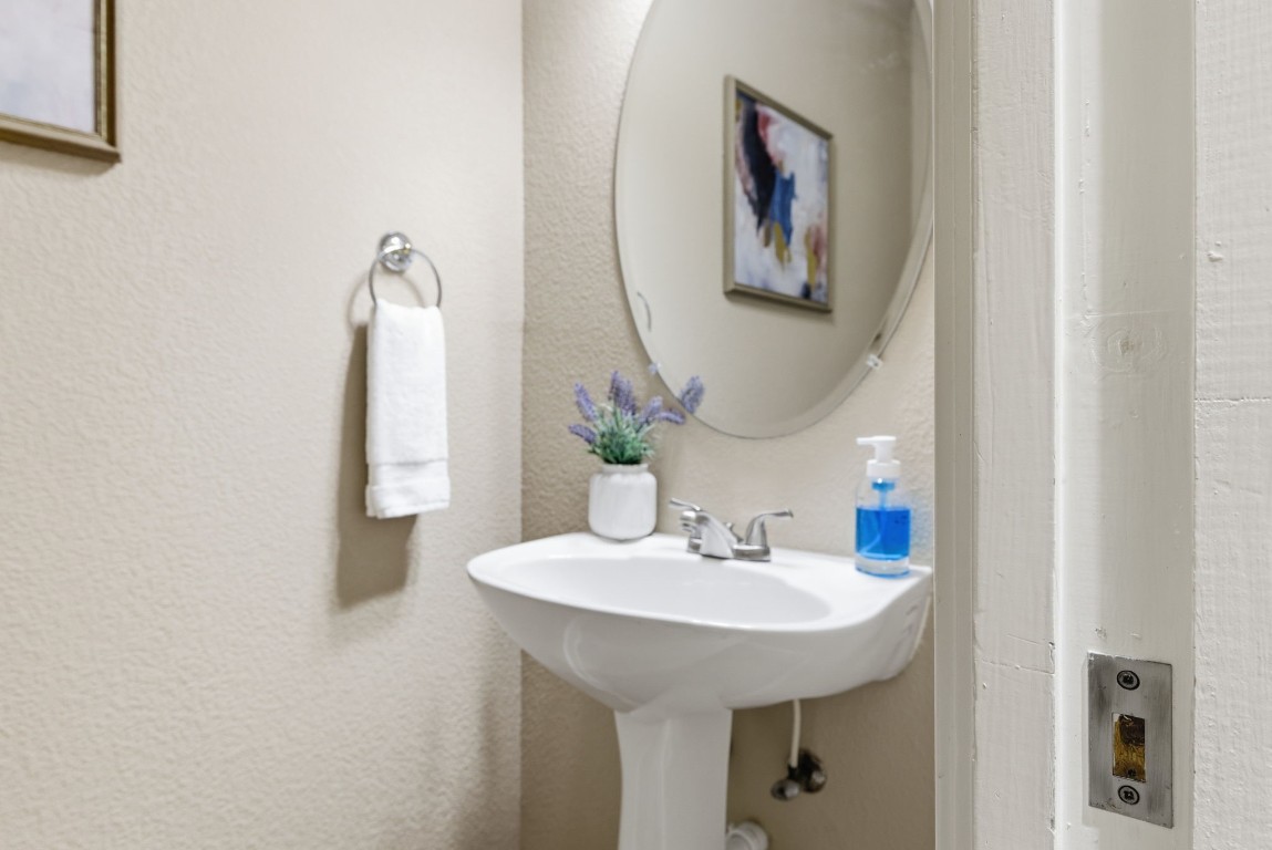 2291 Frontier Spring Branch, TX 78070 - Photo 29 of 39 a bathroom with a sink and a mirror