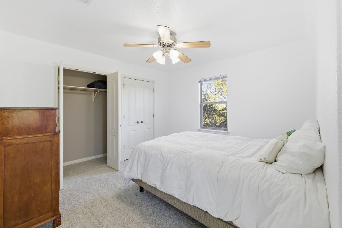 2291 Frontier Spring Branch, TX 78070 - Photo 34 of 39 a bedroom with a bed and a window