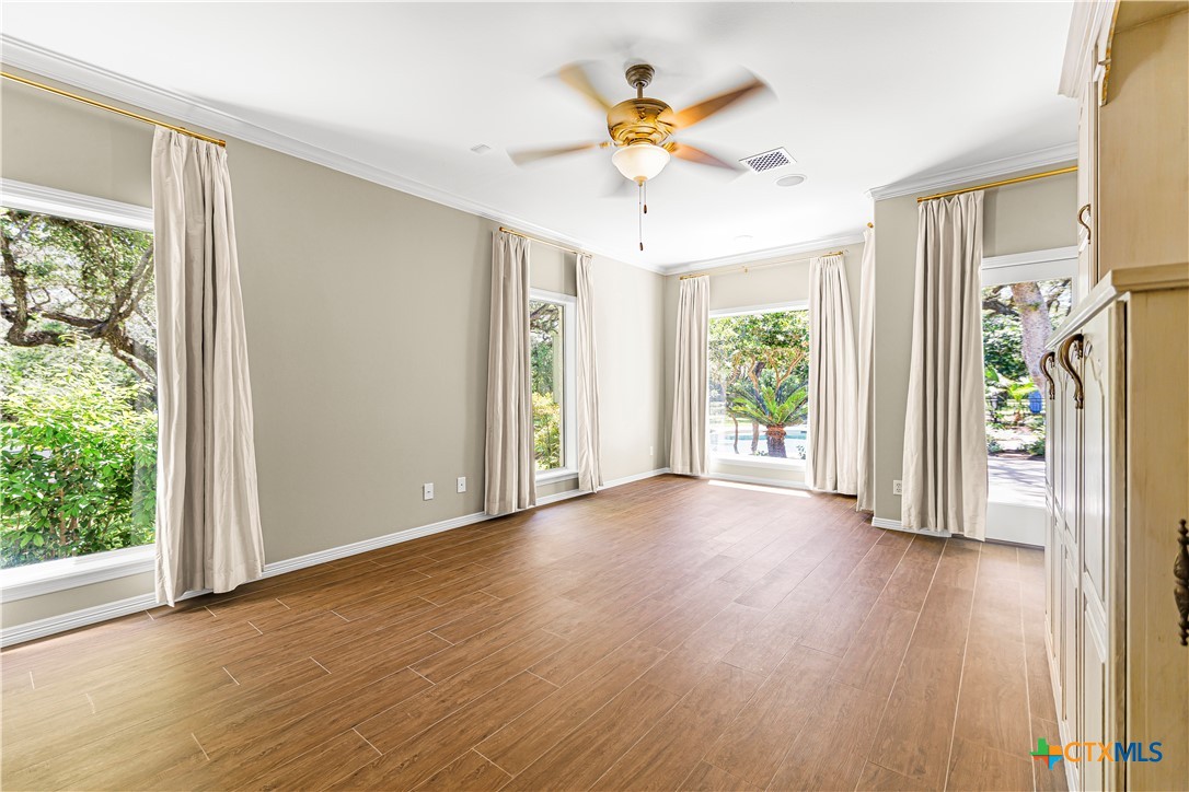 313 Treasure Oaks Road Inez, TX 77968 - Photo 14 of 47 a view of an empty room with a window