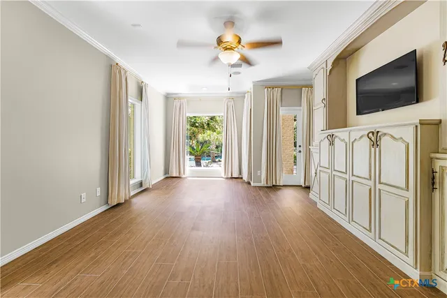 a view of entryway with wooden floor