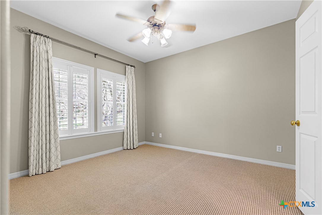 313 Treasure Oaks Road Inez, TX 77968 - Photo 22 of 47 a view of an empty room with a window