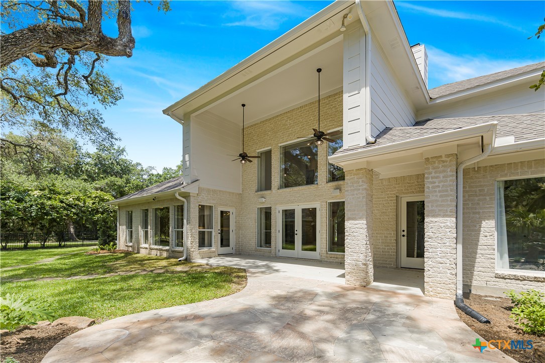 313 Treasure Oaks Road Inez, TX 77968 - Photo 35 of 47 a front view of a house with a garden