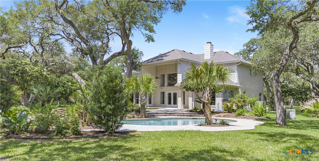 313 Treasure Oaks Road Inez, TX 77968 - Photo 37 of 47 a front view of a house with a yard