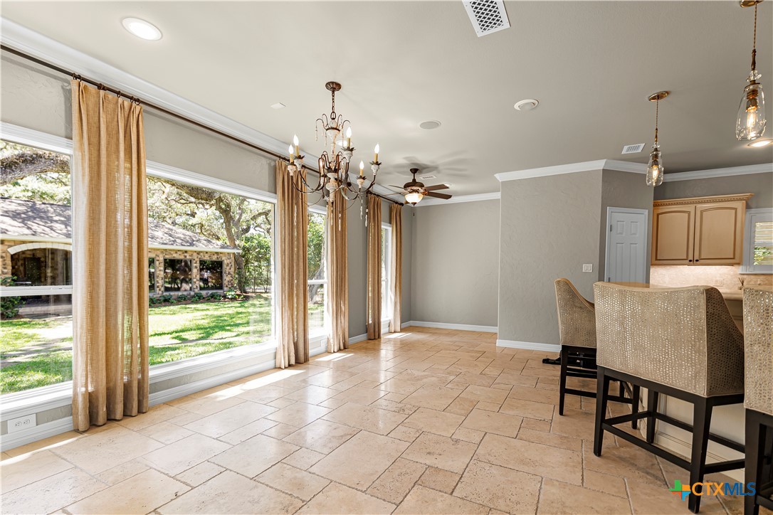 313 Treasure Oaks Road Inez, TX 77968 - Photo 9 of 47 a view of a livingroom with furniture window and outside view