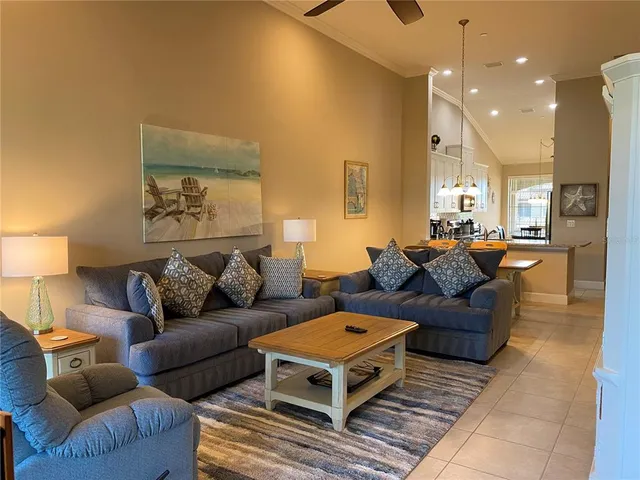 a living room with furniture and a couch