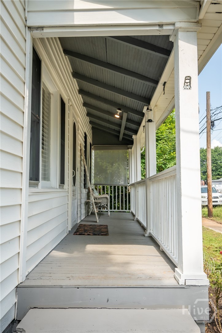 64 Madison Street Commerce, GA 30529 - Photo 3 of 21 Rocking chair front porch