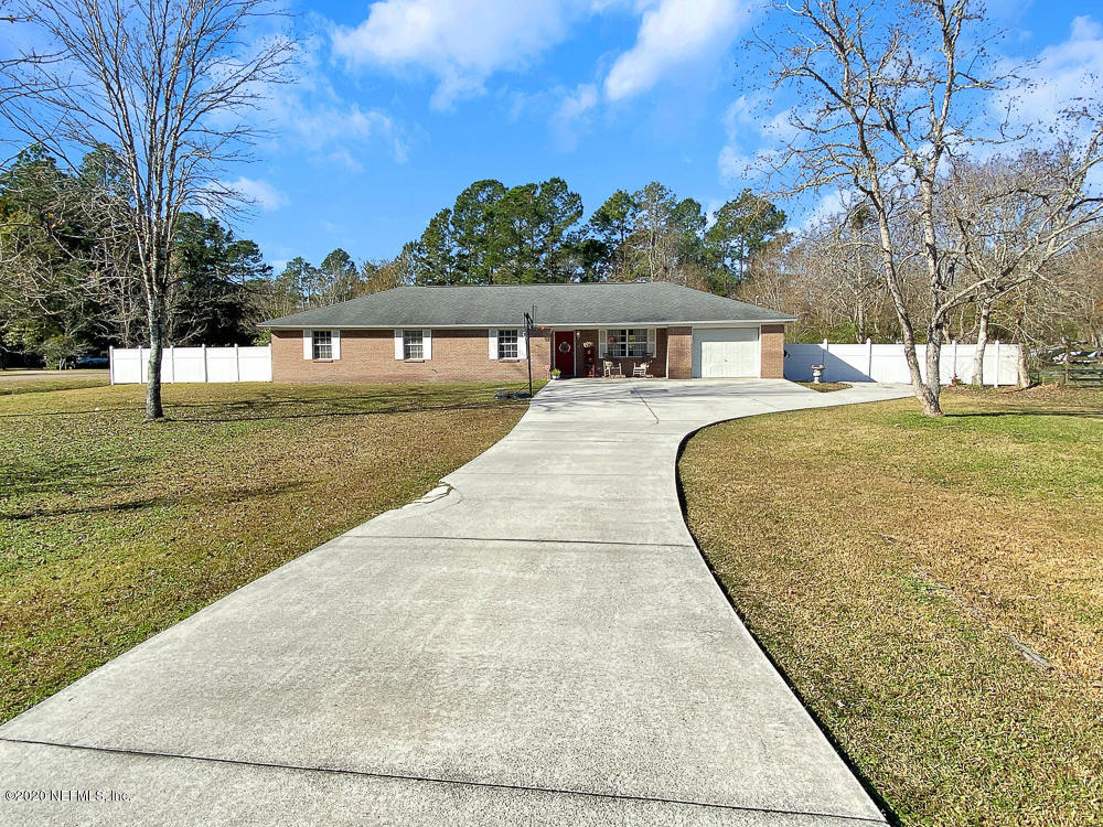 54071 Armstrong Road Callahan, FL 32011 - Photo 2 of 26 a view of backyard with outdoor space