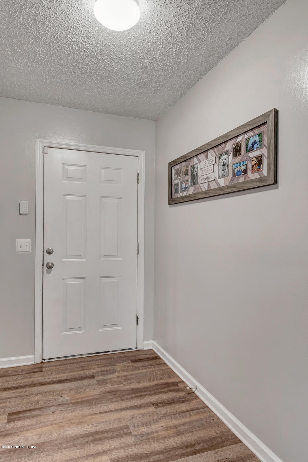 54071 Armstrong Road Callahan, FL 32011 - Photo 3 of 26 a view of a room with wooden floor