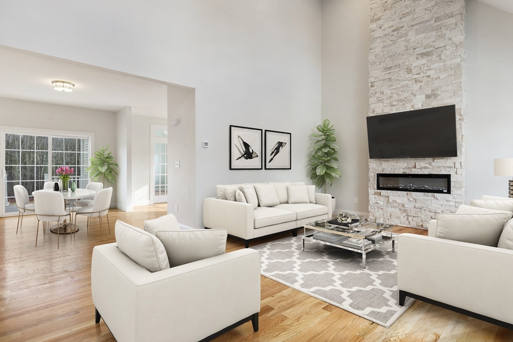 Lot 30 May Road Millis, MA 02054 - Photo 19 of 31 a living room with furniture and a flat screen tv