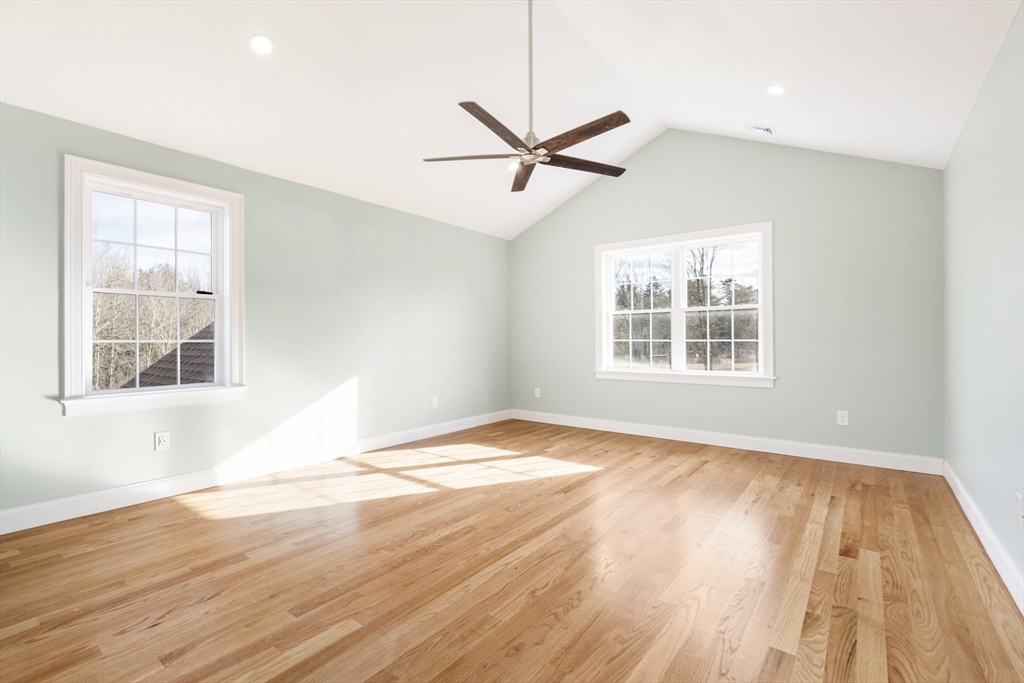 Lot 30 May Road Millis, MA 02054 - Photo 25 of 31 a view of an empty room with wooden floor and a window