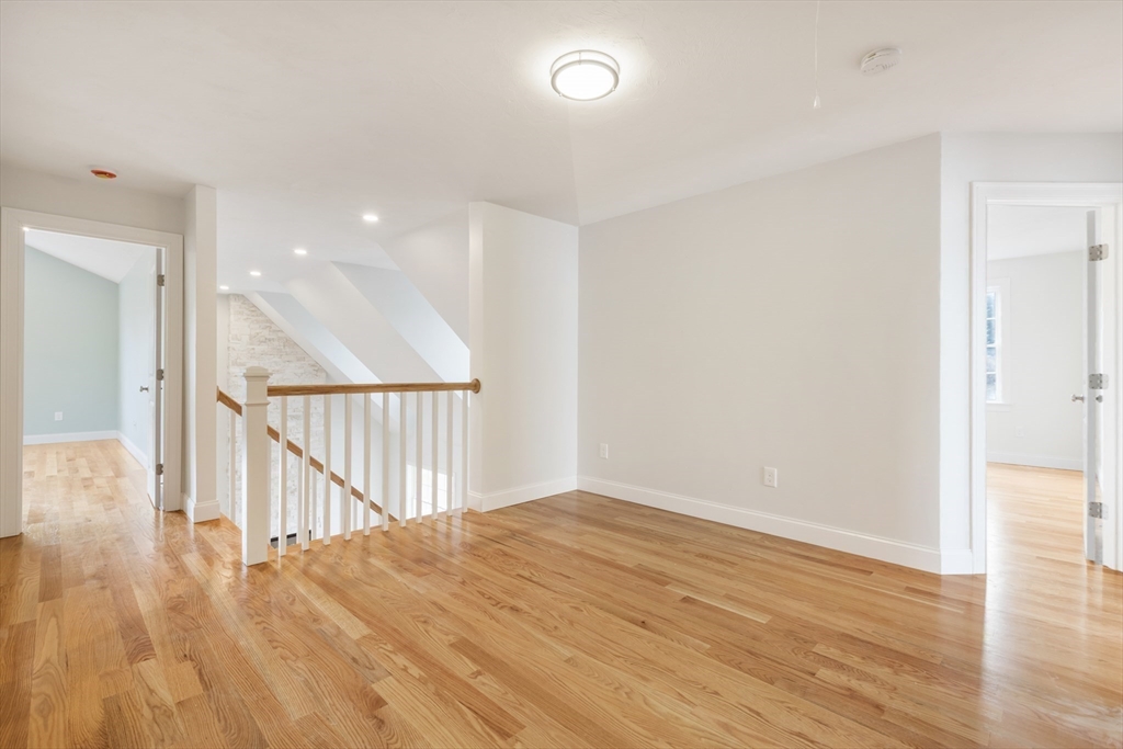 Lot 30 May Road Millis, MA 02054 - Photo 27 of 31 a view of a hallway with wooden floor