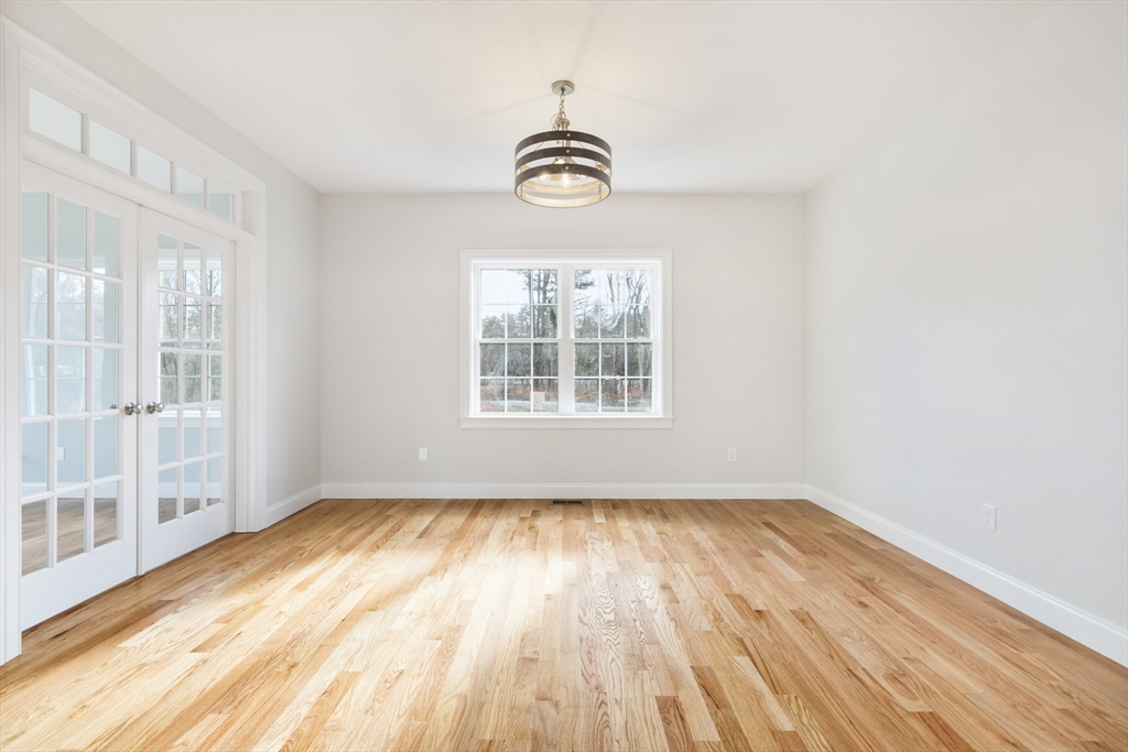 Lot 30 May Road Millis, MA 02054 - Photo 6 of 31 a view of empty room with wooden floor and fan