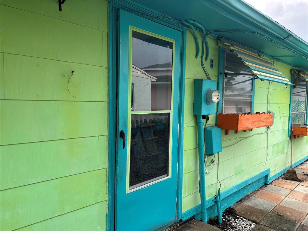 18006 4th Street East Redington Shores, FL 33708 - Photo 7 of 32 a view of a door and an empty room