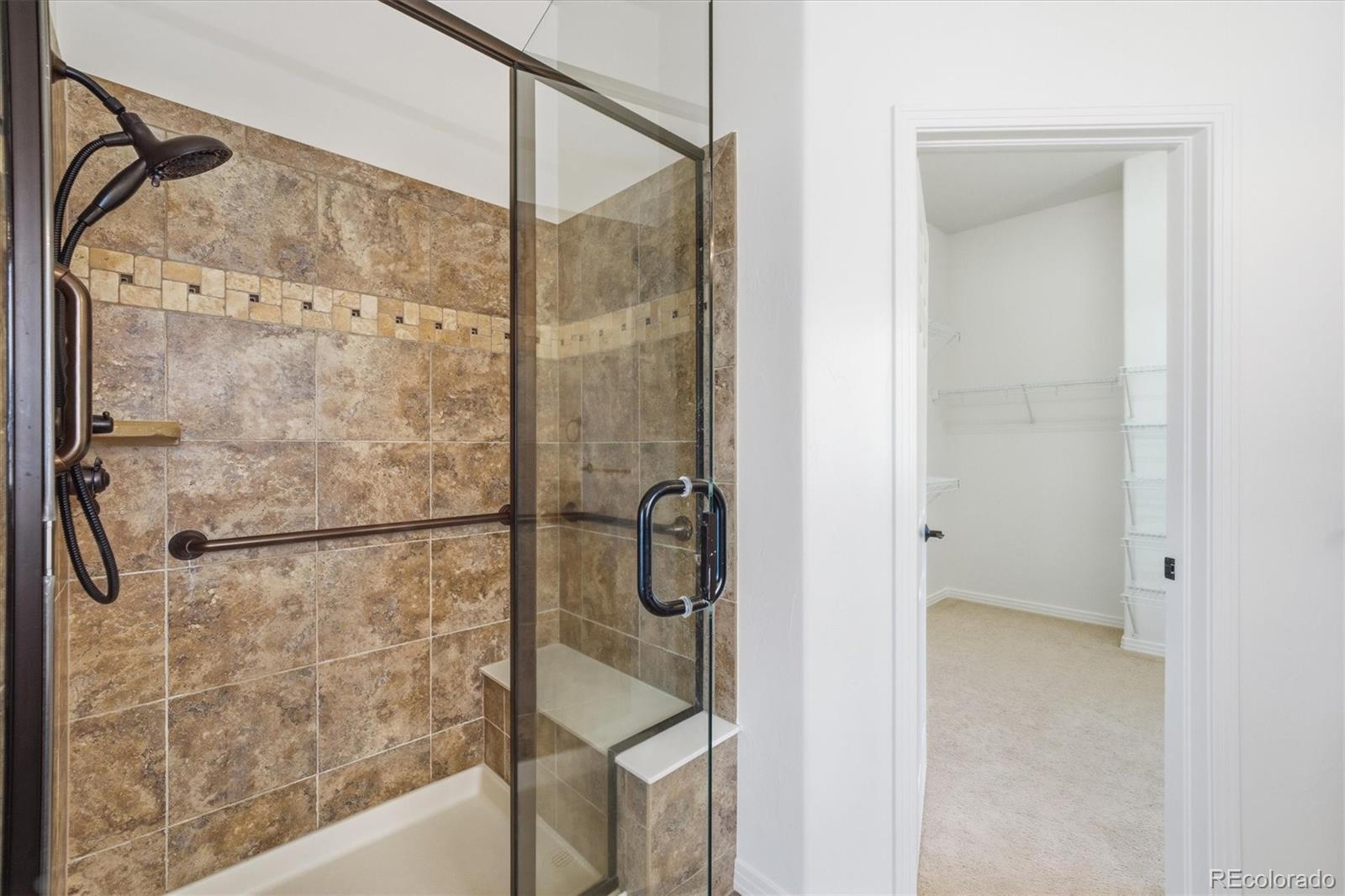 477 Rifle Way Broomfield, CO 80020 - Photo 20 of 45 a bathroom with a shower