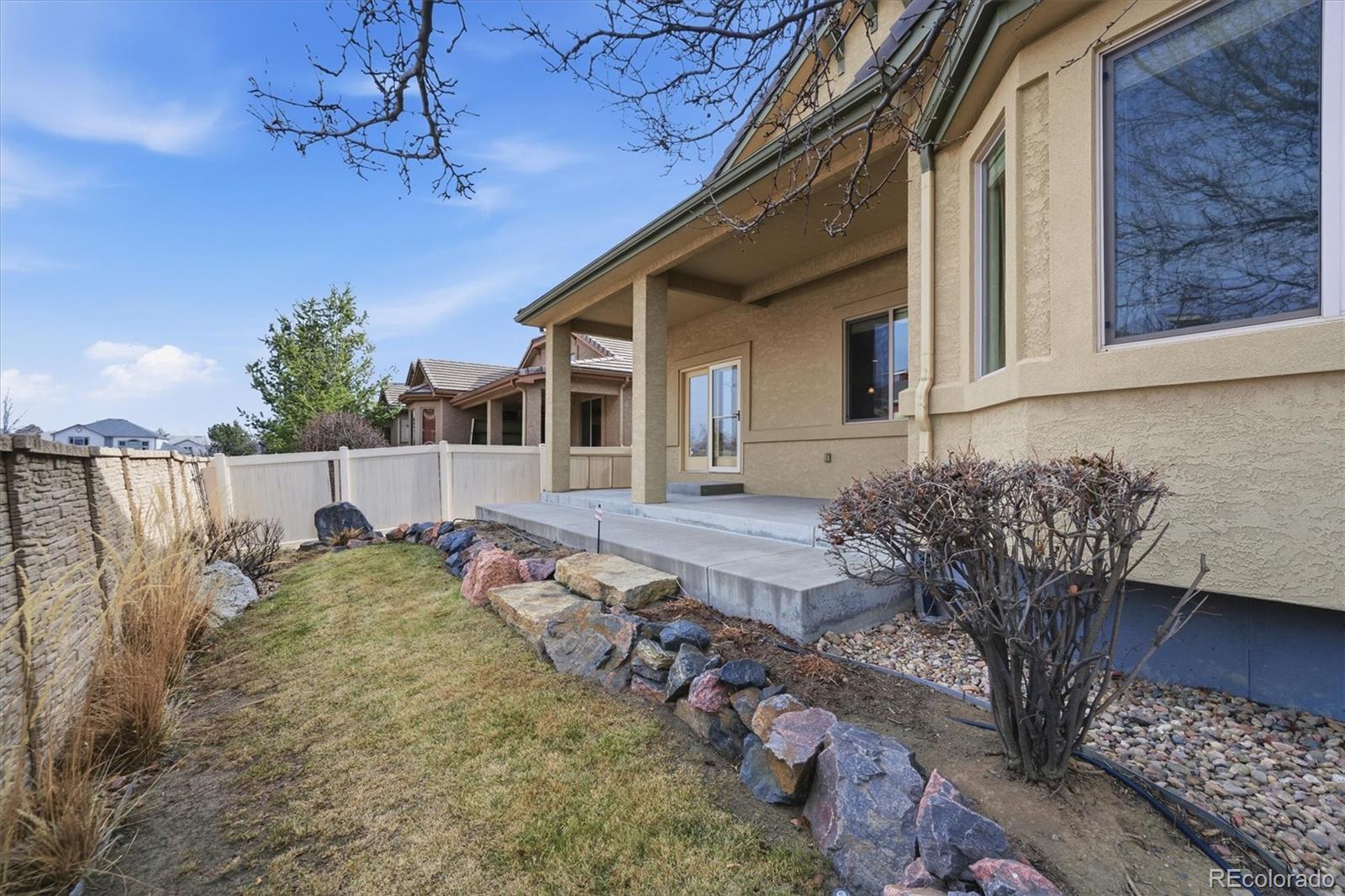 477 Rifle Way Broomfield, CO 80020 - Photo 39 of 45 a house view with a outdoor space