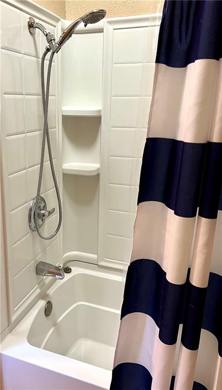 166 Tony Row Road Star Junction, PA 15482 - Photo 20 of 25 a bathroom with a bathtub and a shower