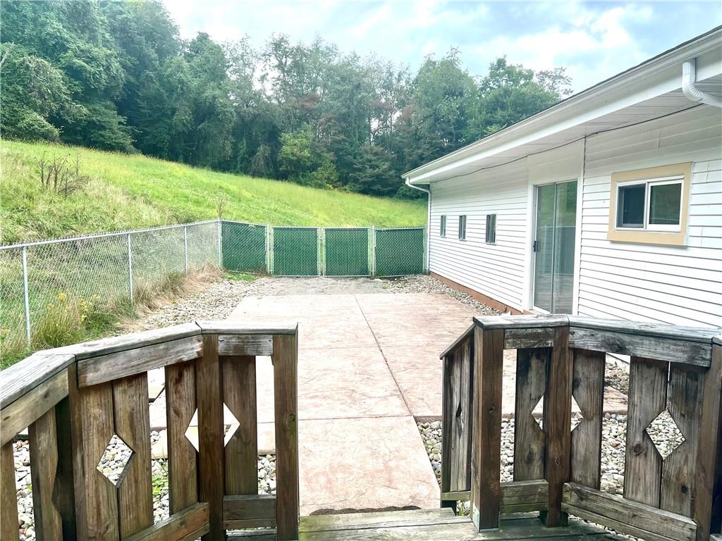 166 Tony Row Road Star Junction, PA 15482 - Photo 23 of 25 a view of a house with backyard and sitting area