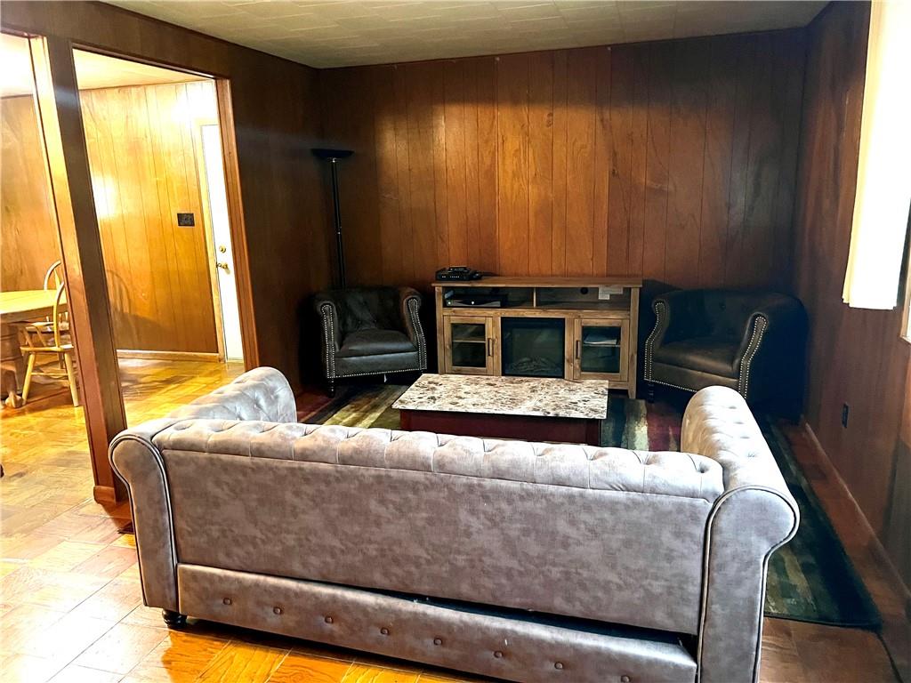 166 Tony Row Road Star Junction, PA 15482 - Photo 6 of 25 a living room with furniture and a fireplace
