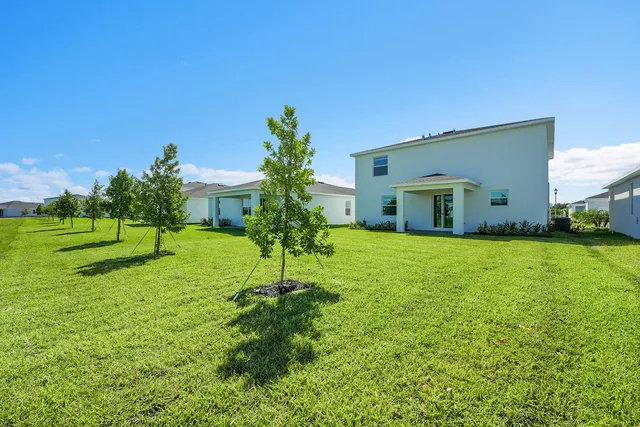 a house view with a garden space