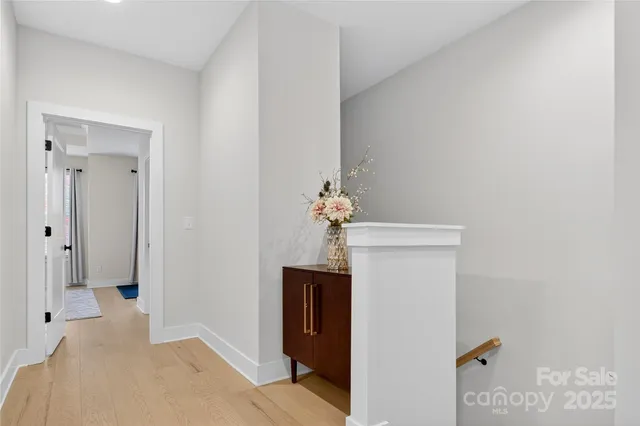 a view of a hallway with front door