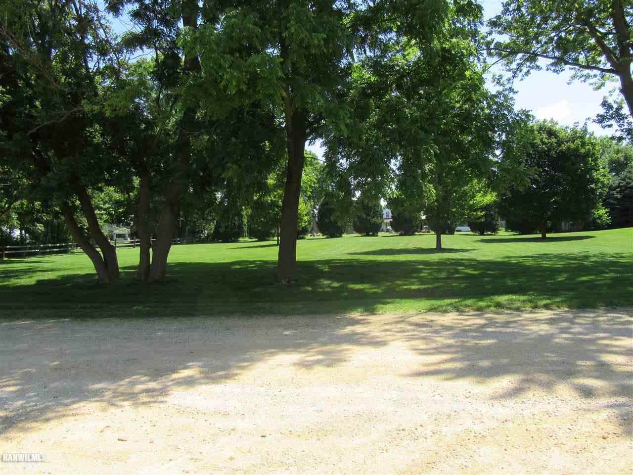 a view of a park with tree s