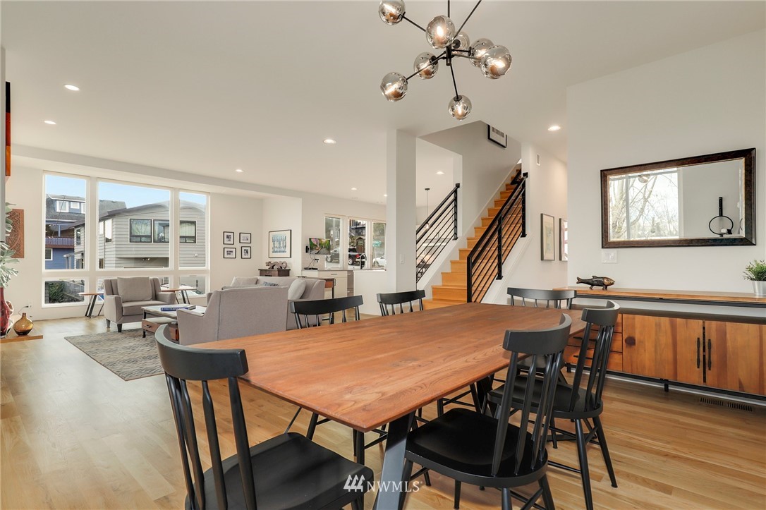 3740 34th Avenue Southwest Seattle, WA 98126 - Photo 14 of 31 a view of a dining room with furniture and wooden floor