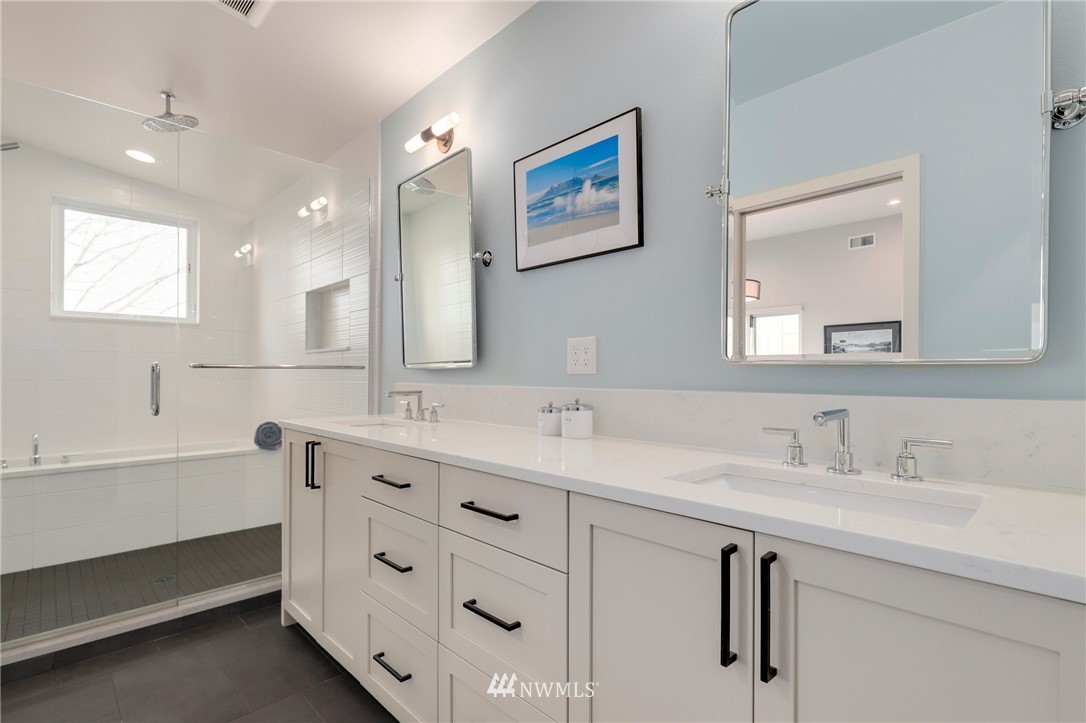 3740 34th Avenue Southwest Seattle, WA 98126 - Photo 19 of 31 a bathroom with a double vanity sink mirror and bathtub