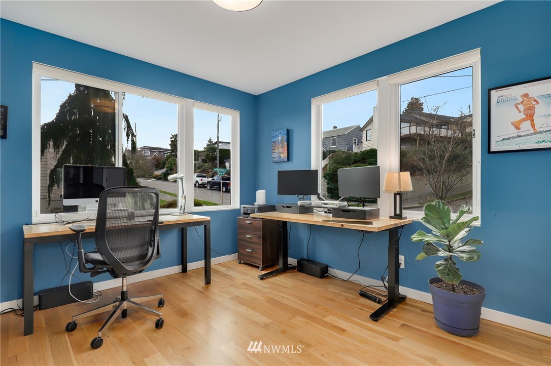 3740 34th Avenue Southwest Seattle, WA 98126 - Photo 5 of 31 a view of a workspace with furniture