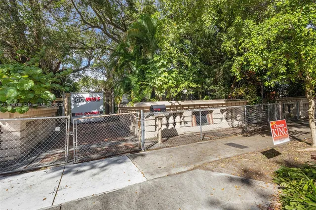 a view of a house with a street